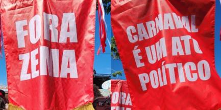 Integrantes do Juventude Bronzeada desfilam com estandartes com dizeres políticos (Raquel Gontijo / Hoje em Dia)