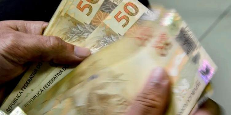 Caixa Econômica Federal paga parcela de agosto do Bolsa Família aos beneficiários NIS de final 4 (Marcello Casal Jr/Agência Brasil/Arquivo)
