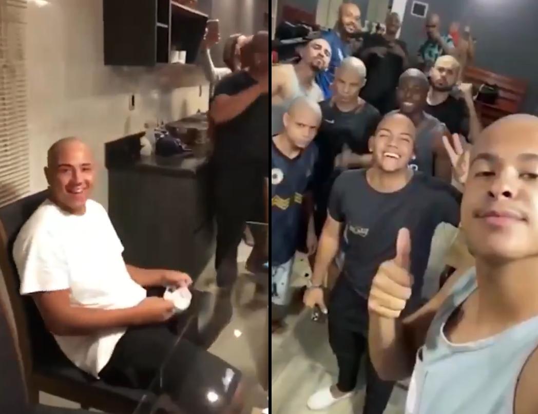 Quinze amigos e parentes de Túlio Silva (esq.) rasparam a cabeça para apoiá-lo no tratamento do câncer (Facebook / Reprodução)