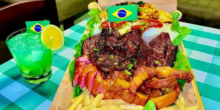 No Sô Madruga, no bairro Ouro Preto, torcedores poderão assistir ao jogo do Brasil contra a Suíça, na segunda-feira, às 13h, saboreando o “Brasil na Telha”ou o prato suíço “Batata Rosti” (Reprodução Redes Sociais)
