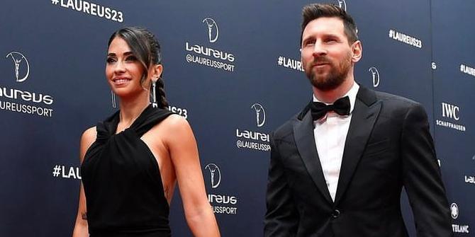 Messi ao lado da mulher na chegada ao "Oscar do Esporte" (Divulgação/Laureus)