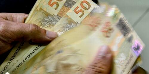 Taxa Selic cai 0,5 ponto percentual depois da última reunião do Comitê de Política Monetária do Banco Central e economistas analisam o cenário como positivo (Reprodução Agência Brasil)